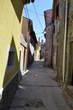 Labin - Narrow street between old houses 