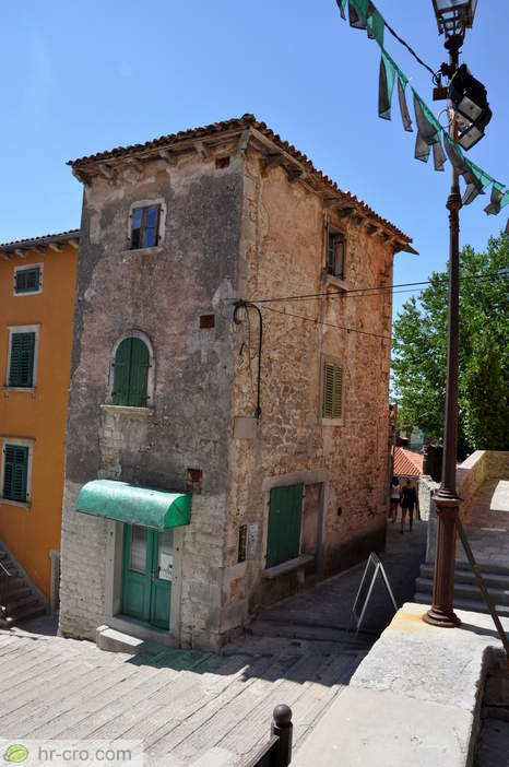 Old stone house beside the street - Photo: 900002-58 Old stone house beside the street