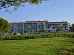 Pošesi - Accommodation building beyond a lawn 