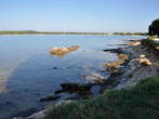 Pošesi - Pale rock in a shallow cove 