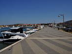Waterfront - Long waterfront promenade beside moored boats 