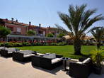 Waterfront - Seating area beside a waterfront lawn 