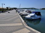 Waterfront - Waterfront beside a row of small motorboats 
