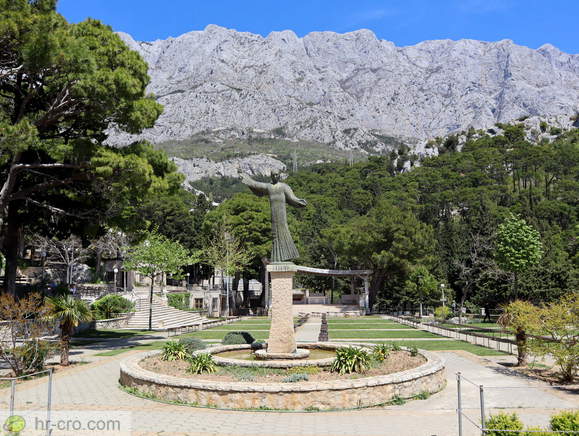 Statue of archangel Gabriel with Biokovo in the background
