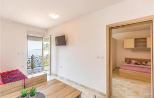 Nice Apartment In Krvavica With House Sea View