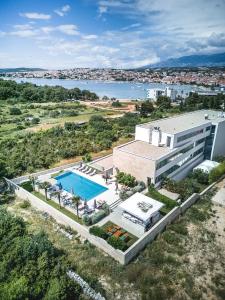 Family friendly apartments with a swimming pool Novalja, Pag - 15882